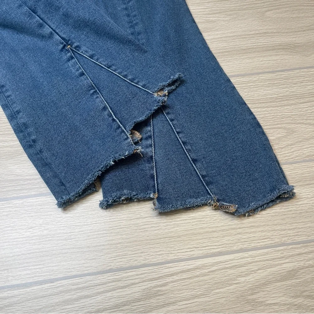 Good American Blue Raw Hem Split Flare Jeans